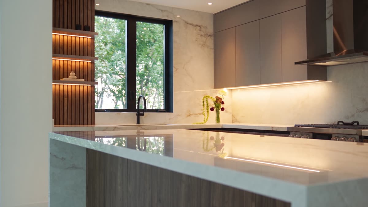 Kitchen with walnut louvers and porcelain island